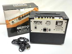 An Orange Crush 20 Guitar Amplifier Combo, in box.