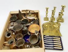 A group of assorted metal wares, to include various copper measures including Victorian examples, Vi