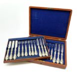 A mahogany cased Victorian Walker & Hall silver plated set of dessert eaters, for twelve settings, c