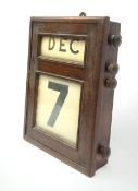 A mahogany cased perpetual wall calendar, with label detailed Fairfield S & E Company Limited Govan,