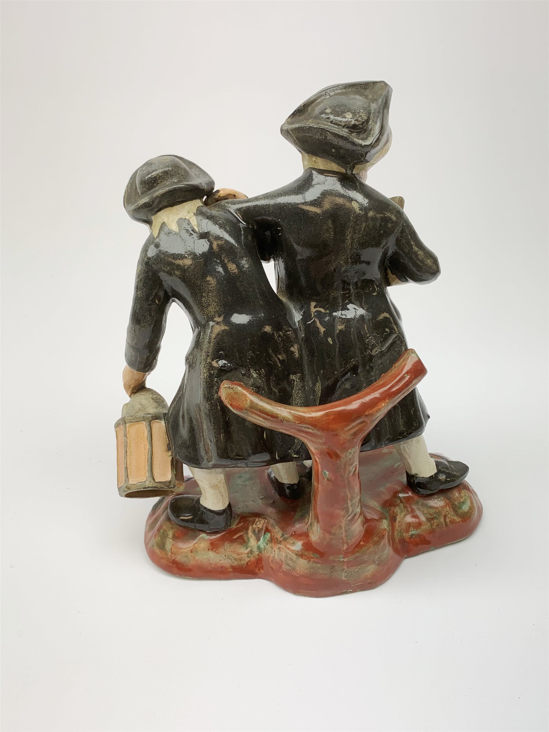 A 19th century Staffordshire figure group, 'Town Crier and Drunk', upon oval scroll detailed base, H - Image 4 of 7