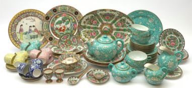 A Chinese tea set, comprising seven tea cups, eight saucers, eight side plates, sandwich plate, teap