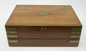 A 19th century mahogany brass bound campaign writing slope, of rectangular form with inset campaign