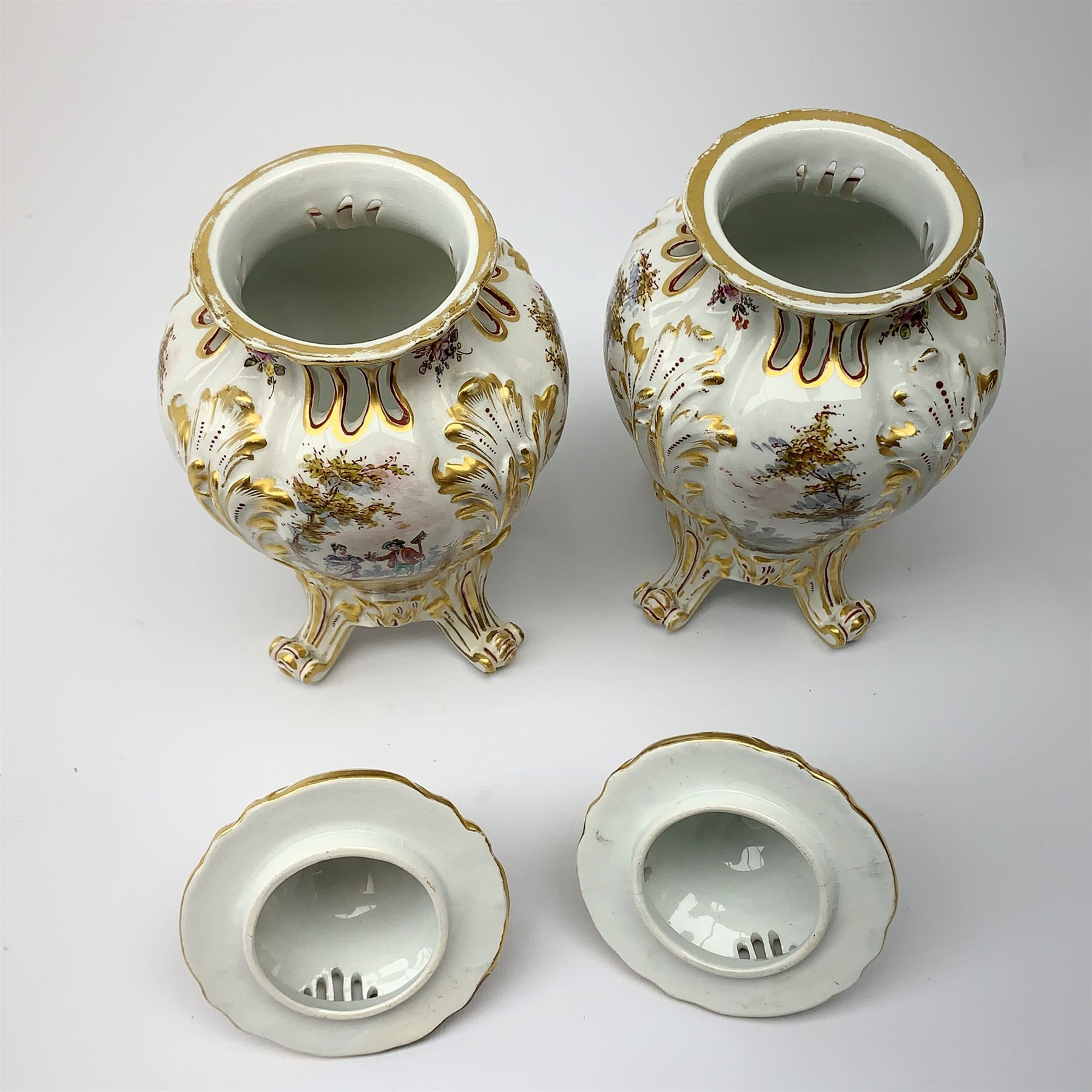 A pair of Continental porcelain vases and covers, each of baluster form raised upon four scroll feet - Image 2 of 3