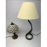 A small Tiffany style table lamp, with leaded glass shade, overall H38cm, together with another tabl