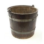 A Victorian coopered oak bucket, with swing handle, excluding handle H28cm, D33cm.