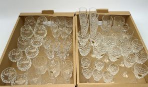 A large quantity of cut lead crystal drinking glasses, to include a number of sets of six, including