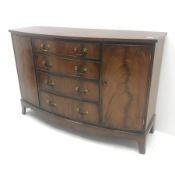 20th century mahogany bow front cross banded sideboard, four graduating drawers flanking two cupboar