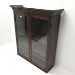 19th century mahogany wall cabinet, projecting cornice above two glazed doors enclosing three shelv