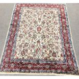 Persian Hamadan red and ivory ground rug, repeating border, central medallion in field of trailing f