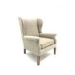 Vintage Parker Knoll wing back armchair, upholstered in natural fabric, W75cm, H97cm