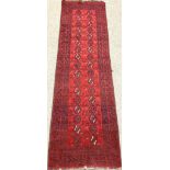 Persian Bokhara red ground runner, elephant foot pattern, 294cm x 76cm