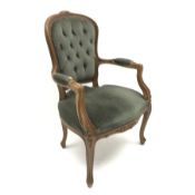 French style walnut framed armchair, carved shaped cresting rail, buttoned upholstered back seat and