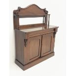 Early Victorian mahogany chiffonier side cabinet, raised shaped back with mirror, single frieze draw