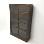 Mid 20th century oak sectional stacking library bookcase, four glazed compartments, platform base, W