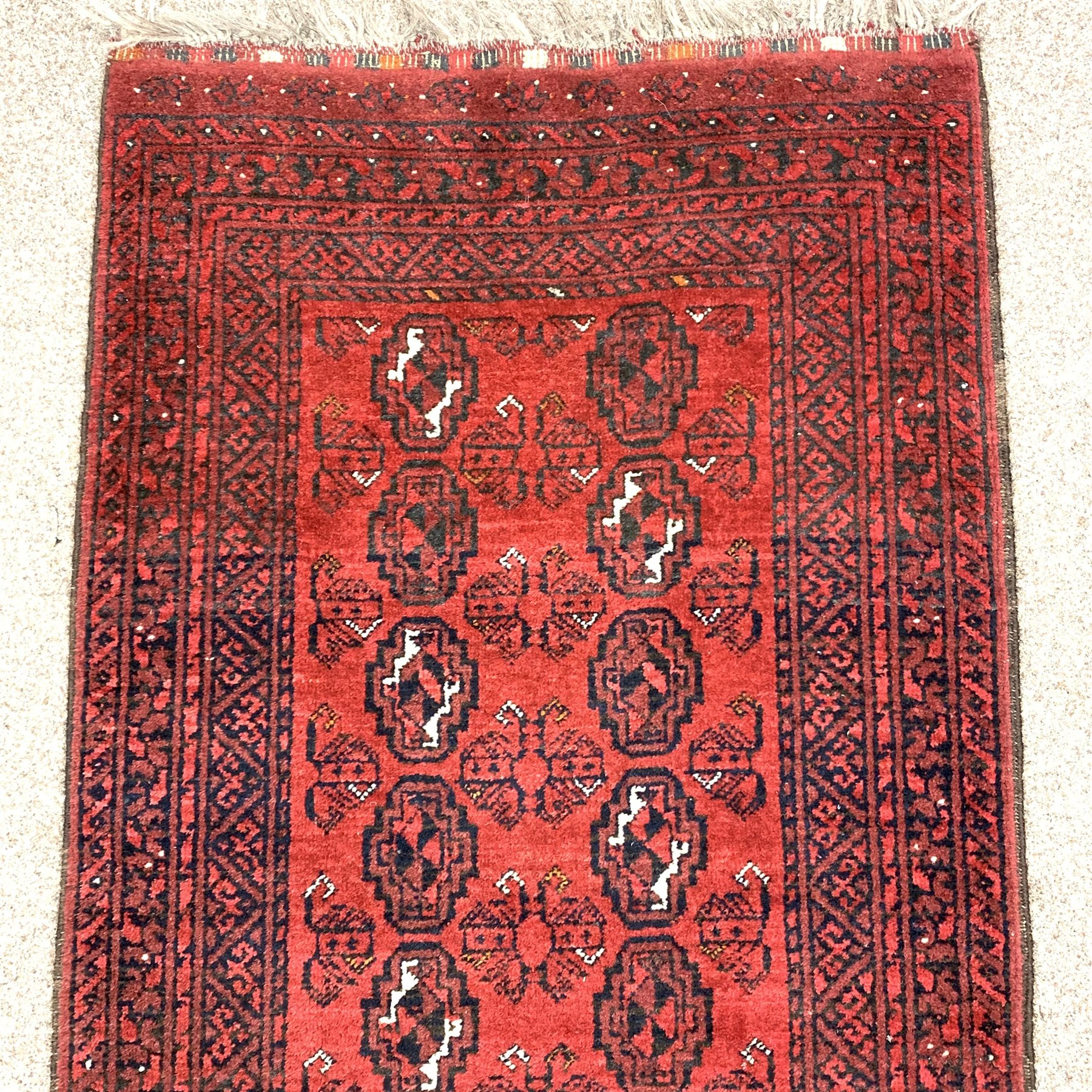 Persian Bokhara red ground runner, elephant foot pattern, 294cm x 76cm - Image 2 of 3