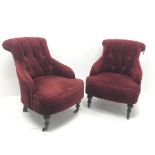 Pair Victorian style bedroom armchairs, upholstered in deep buttoned red fabric, turned supports, W7