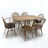 Ercol drop leaf elm and beech dining table (W140cm, H72cm, D75cm) and set six (4+2) Windsor dining c
