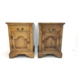 Pair traditional medium oak bedside/lamp cabinets, fitted with cupboard and drawer, W46cm, D43cm, H6