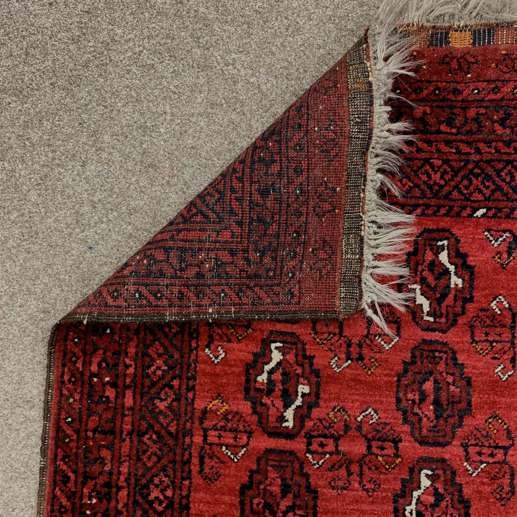 Persian Bokhara red ground runner, elephant foot pattern, 294cm x 76cm - Image 3 of 3