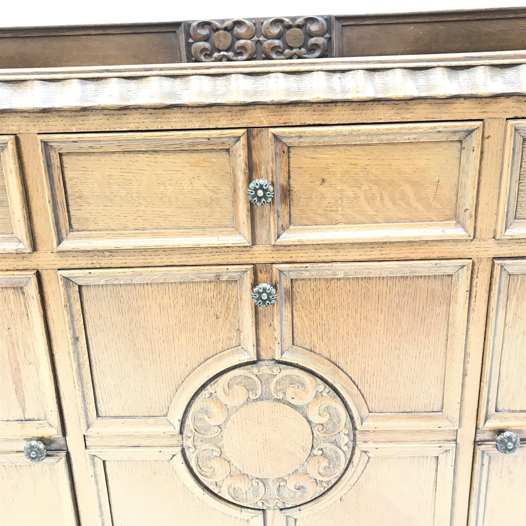 E. Gomme Ltd of High Wycombe oak sideboard, raised carved back, moulded top, three drawers above two - Image 4 of 5