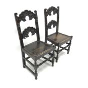 Pair 19th century Yorkshire/Derbyshire type oak hall chairs, detailed carved backs, solid seats, W50