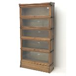 Early to mid 20th century oak Globe Wernicke library bookcase, five tiers with glazed hinged and sli