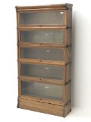 Early to mid 20th century oak Globe Wernicke library bookcase, five tiers with glazed hinged and sli