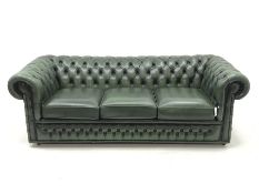 Three seat Chesterfield sofa upholstered in deeply buttoned green leather, W200cm