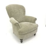 Victorian style spoon back armchair, upholstered in a beige fabric, turned supports, W82cm