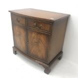 Reproduction Bevan Funnell mahogany serpentine front side cabinet, two drawers above two cupboards,