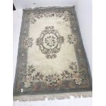 Chinese beige and blue ground washed woollen rug, 277cm x 187cm
