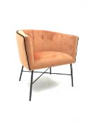 Tub shaped easy chair upholstered in bright rust velvet, metal X framed base, W68cm