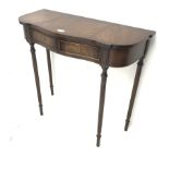 Reproduction Regency style mahogany side table, serpentine front, two drawers, turned tapering suppo