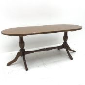 Regency style mahogany coffee table, two turned supports joined by single stretcher on shaped feet,