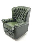 Georgian style wingback reclining armchair upholstered in deeply buttoned green leather, W94cm