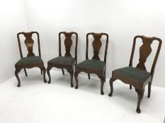 Set four mid 20th century walnut dining chairs, shaped cresting rail and splat, upholstered drop in