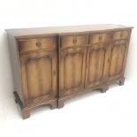 Reproduction Bevan Funnell mahogany breakfront sideboard, fitted with four drawers, above four cupbo