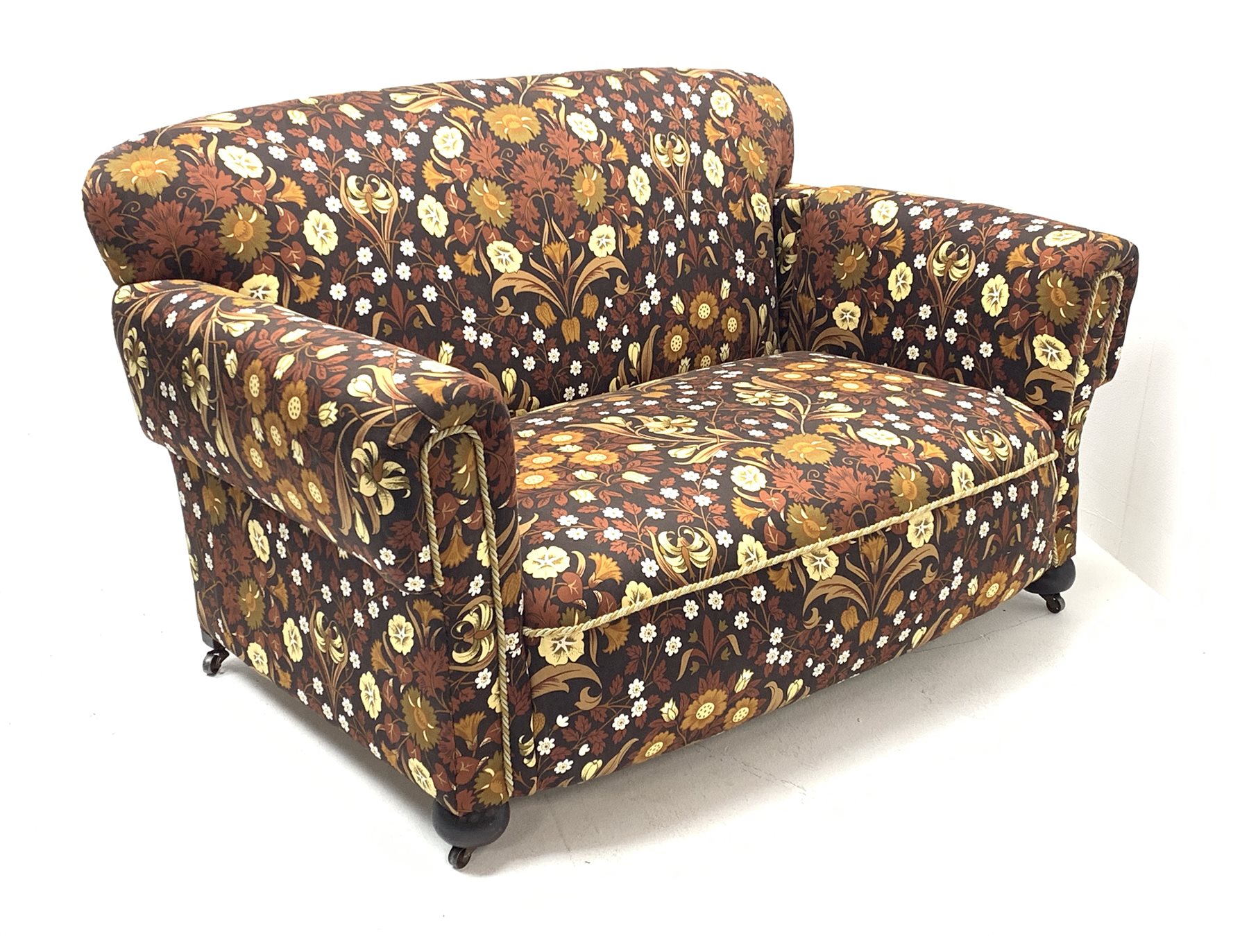 Early 20th century two seat drop end settee upholstered in Willam Morris style patterned fabric, tur