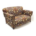 Early 20th century two seat drop end settee upholstered in Willam Morris style patterned fabric, tur