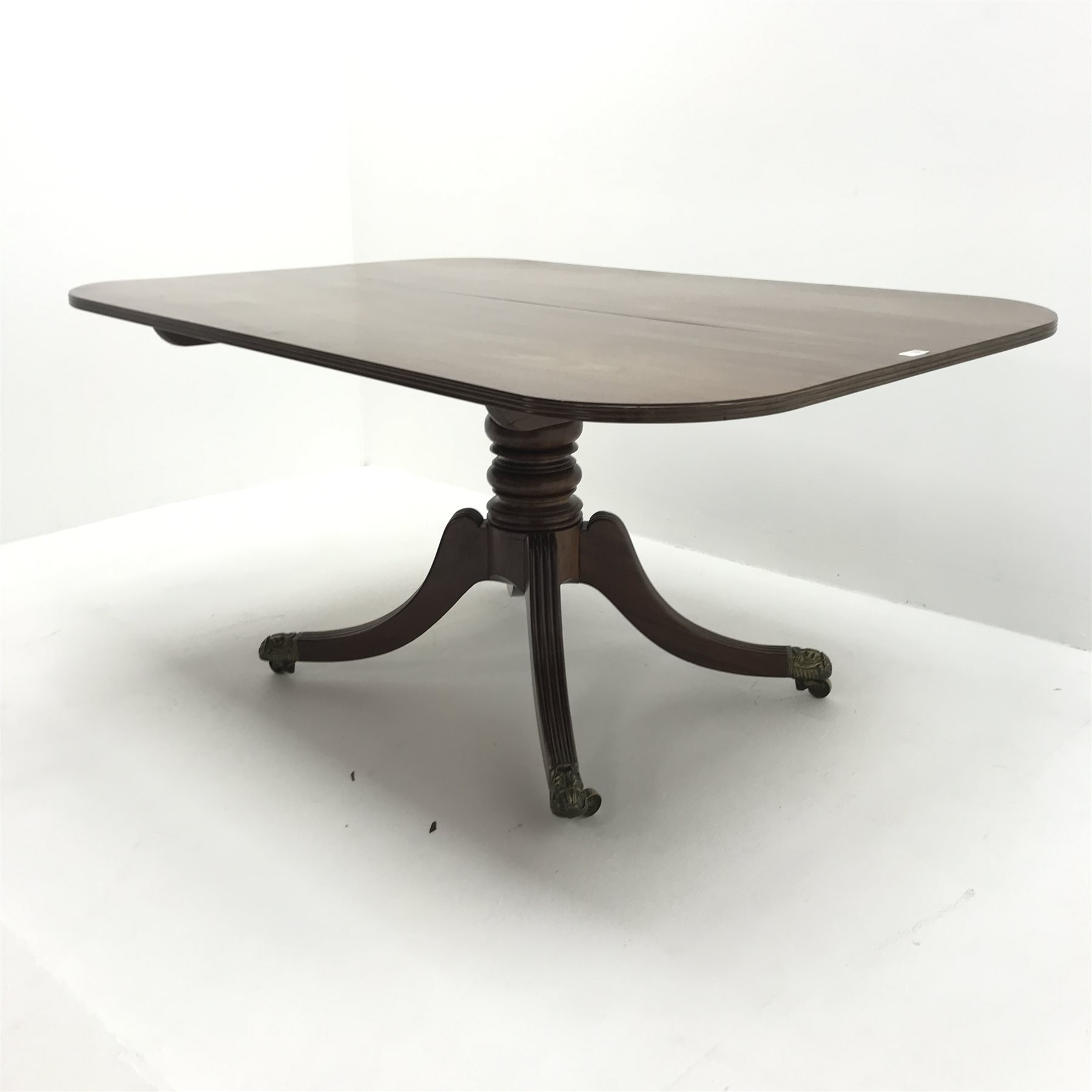 Regency mahogany tilt top table, single turned column on four shaped and reeded brass capped support - Image 3 of 5