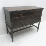 Early 20th century oak chest, two short one long drawer, barley twist supports joined by stretchers,