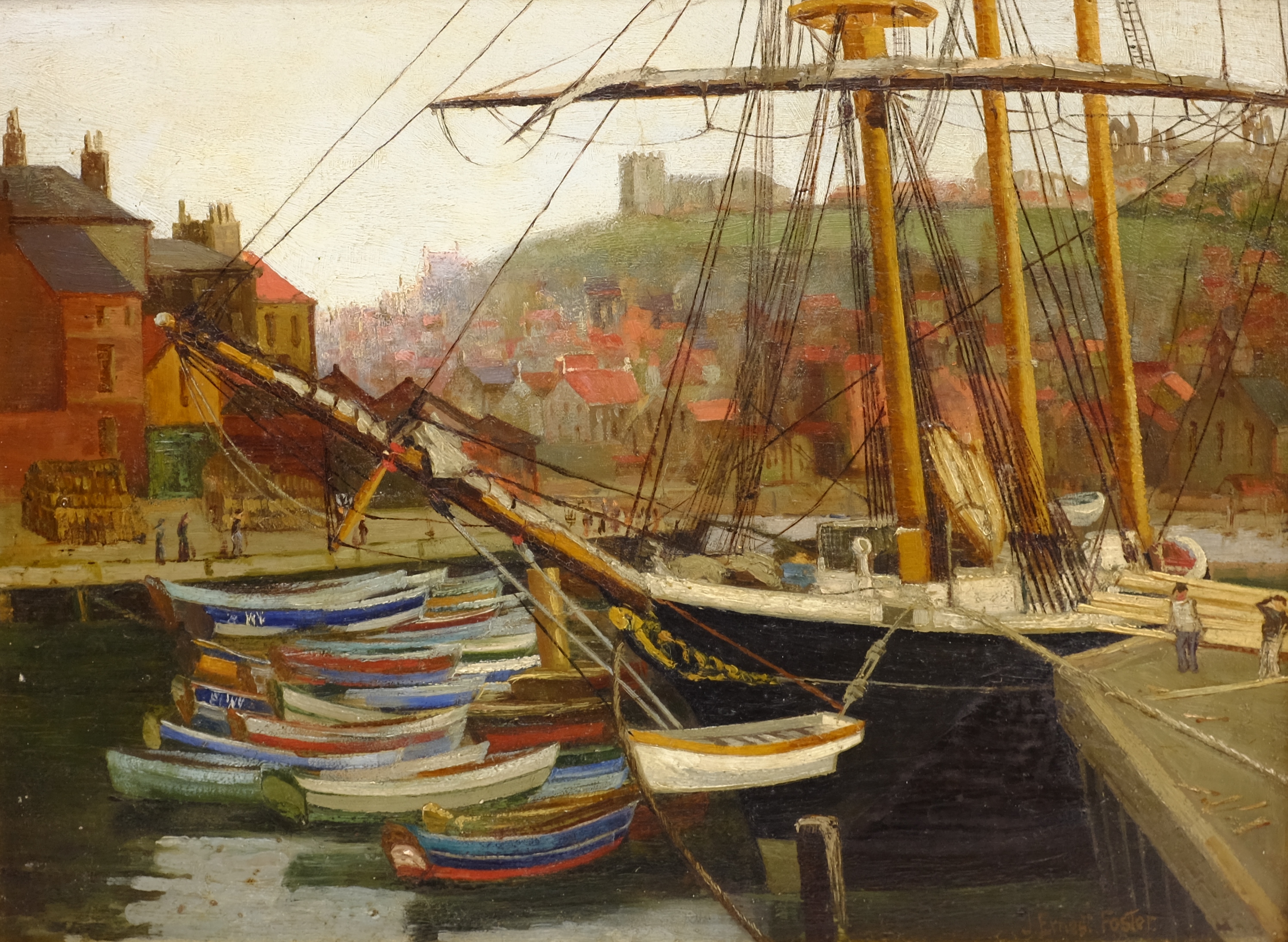 John Ernest Foster (British 1877-1968): Cobles Moored at Whitby, oil on panel signed 29cm x 40cm