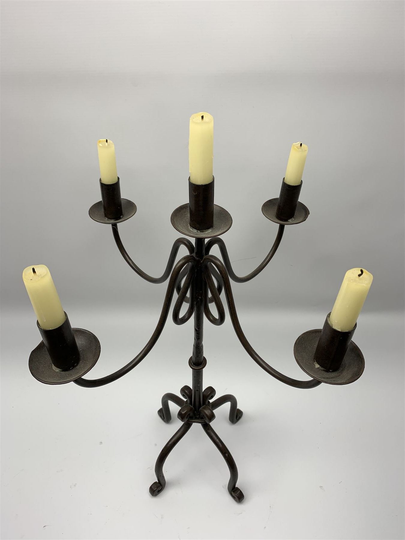 A patinated wrought iron five branch candelabra - Image 2 of 6