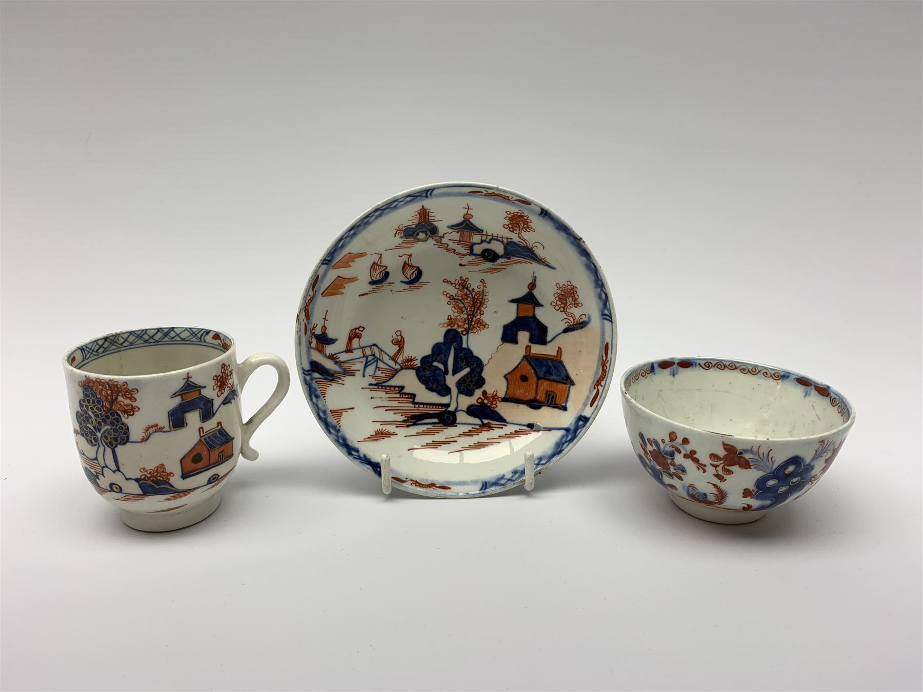 Late 18th Century Lowestoft coffee cup and saucer, circa 1870, decorated in the Dolls House pattern, - Image 2 of 5