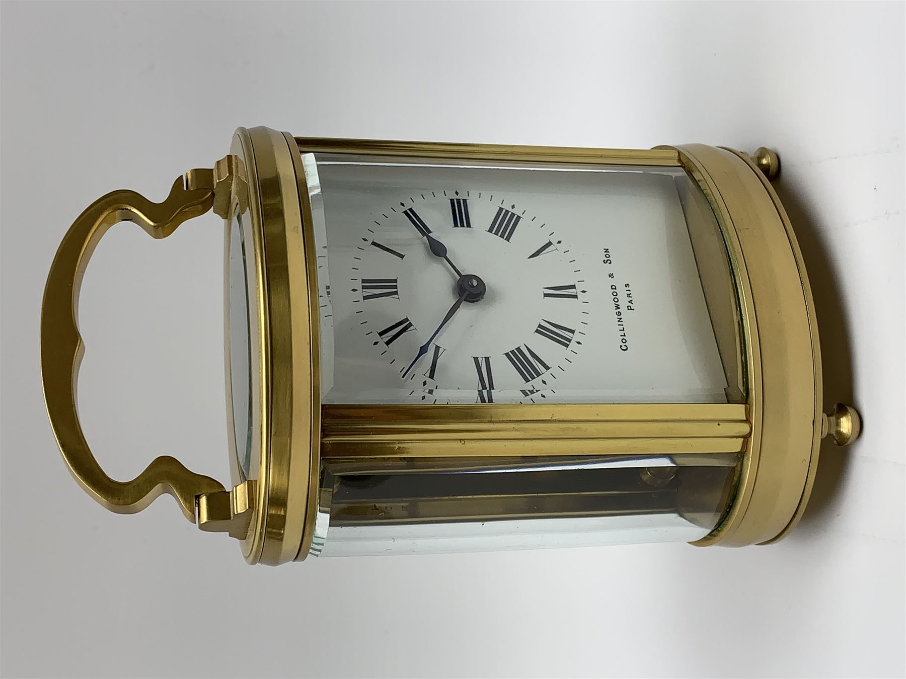 Late 20th century carriage timepiece clock, polished brass case of oval form glazed with bevelled gl - Image 2 of 5