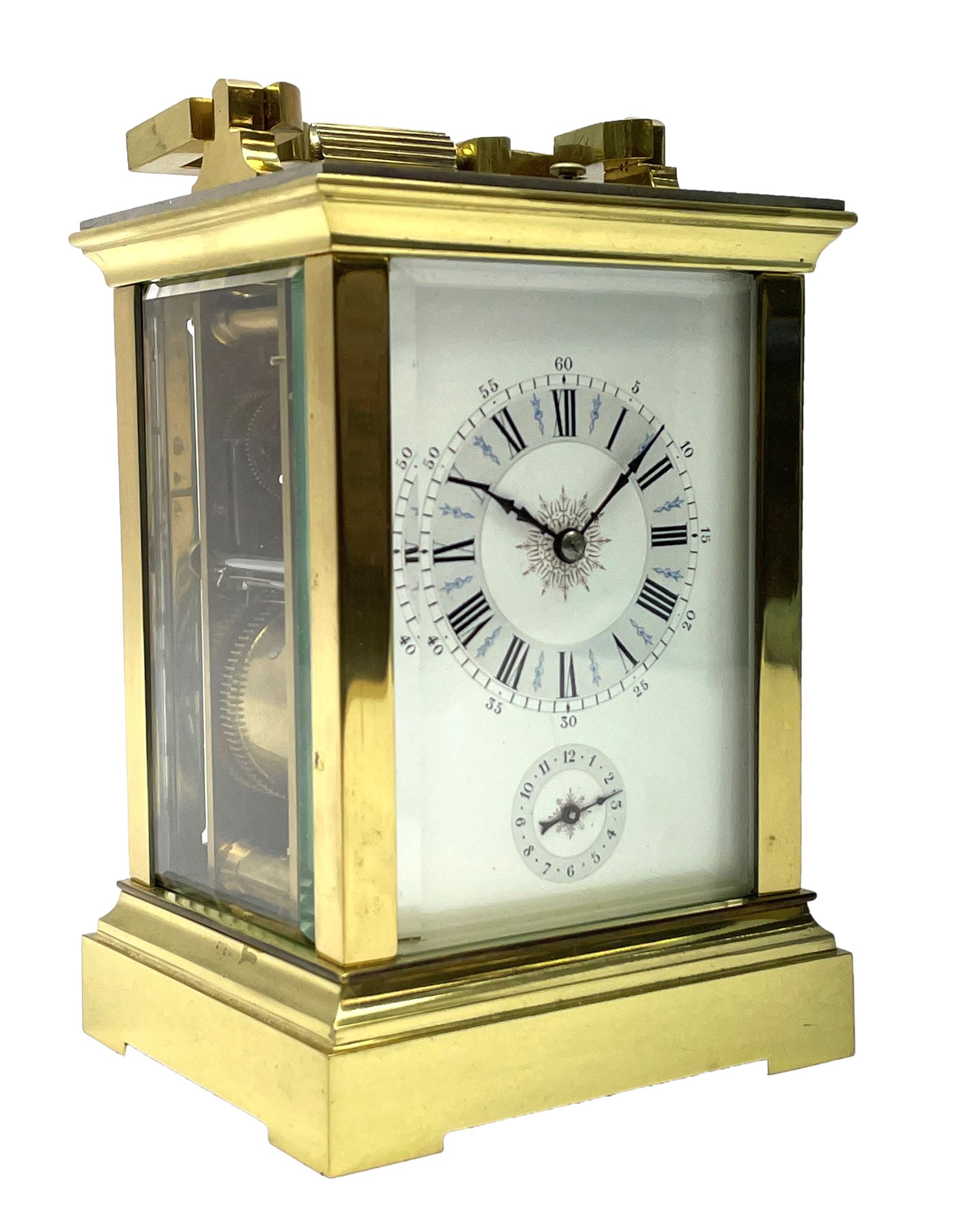 Early 20th century brass and bevelled glass repeater carriage clock with alarm