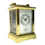Early 20th century brass and bevelled glass repeater carriage clock with alarm