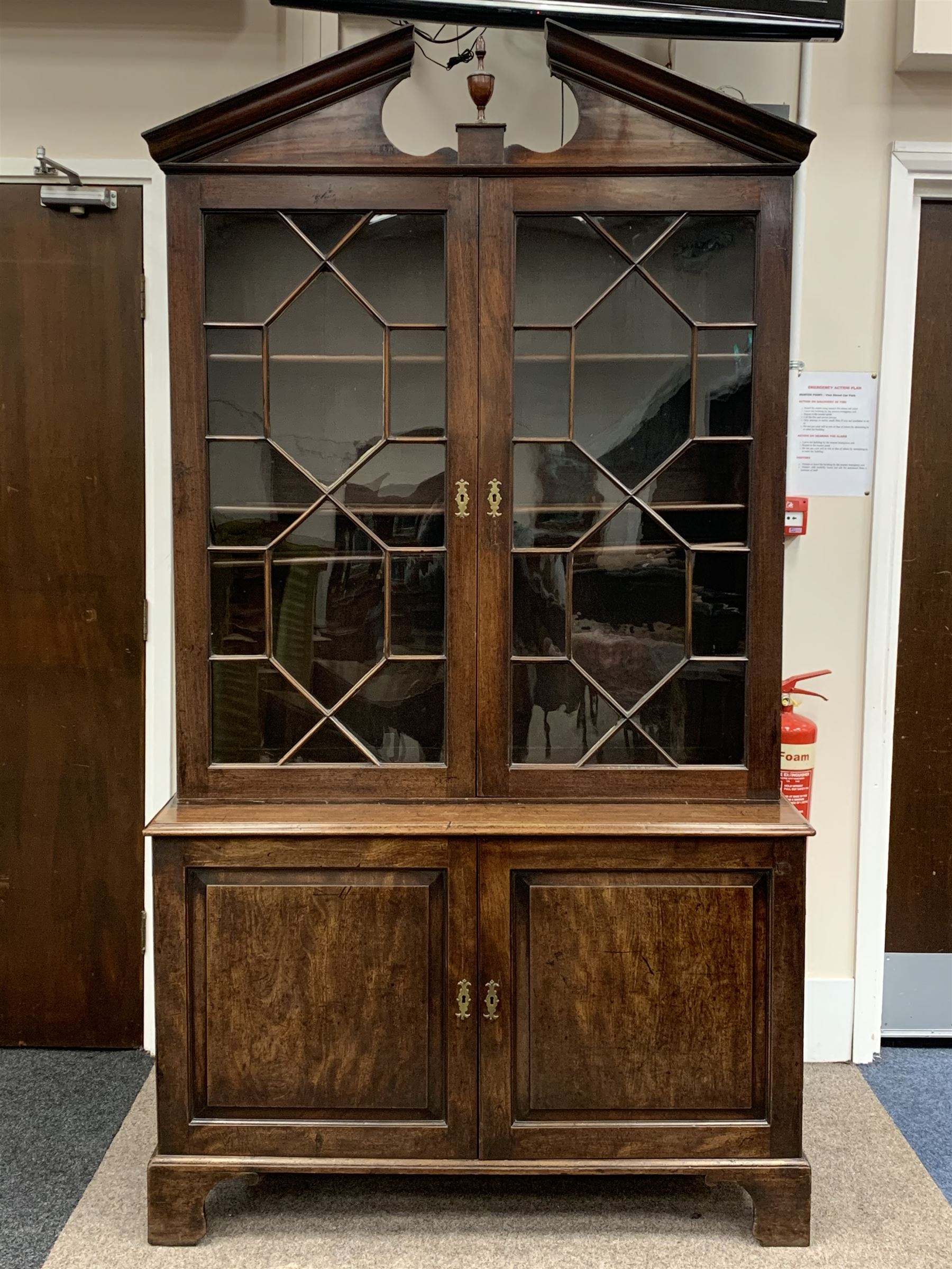 Georgian mahogany bookcase on press cupboard, moulded sloped arch pediment with central turned finia - Image 2 of 8