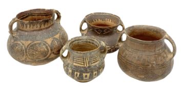 Four Chinese Neolithic pottery vessels